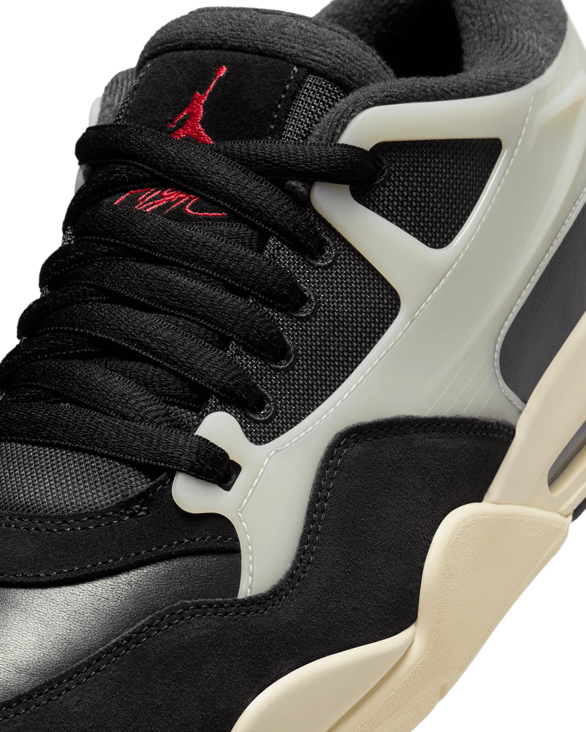 Air Jordan 4 RM - Black / Sail
