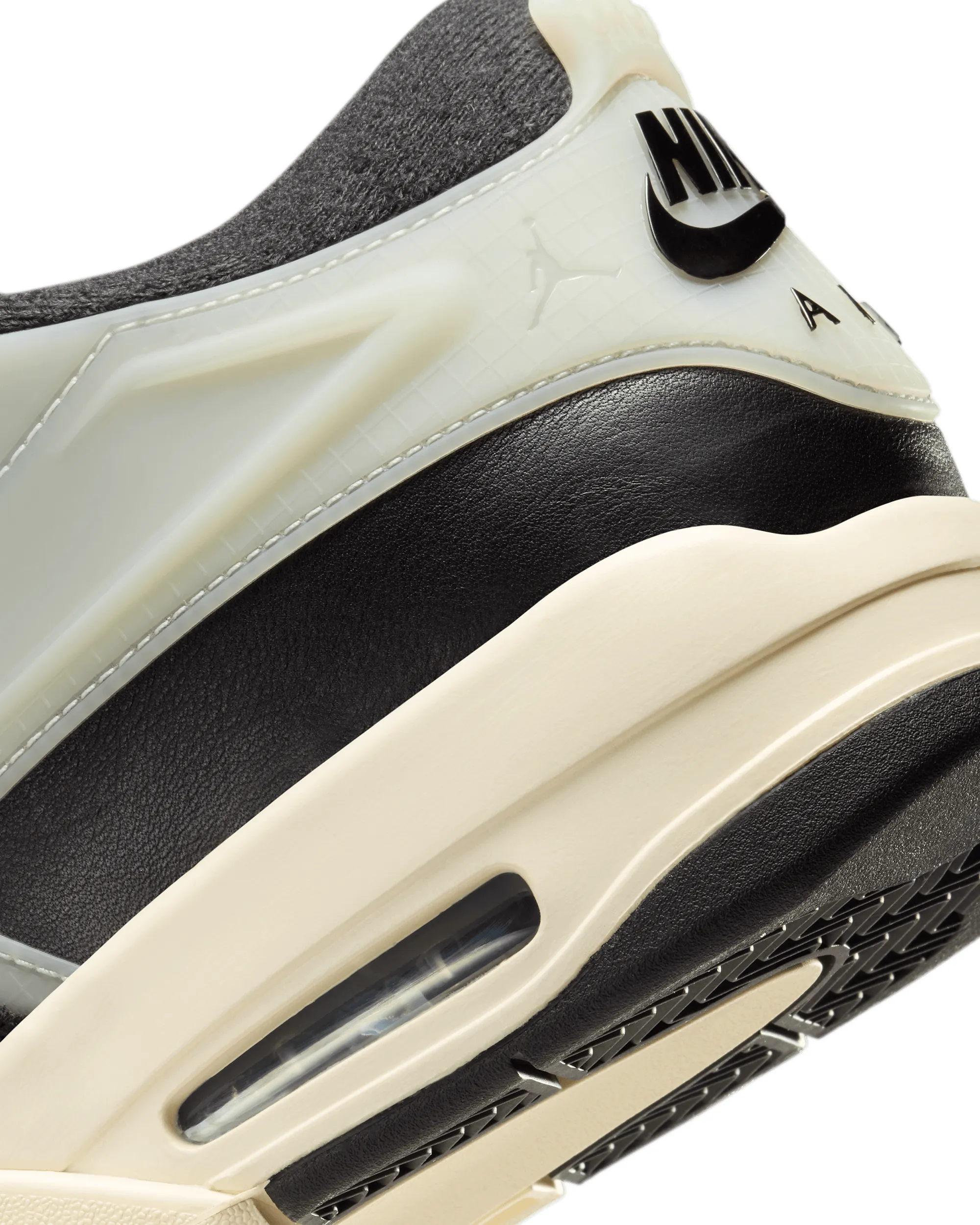 Air Jordan 4 RM - Black / Sail