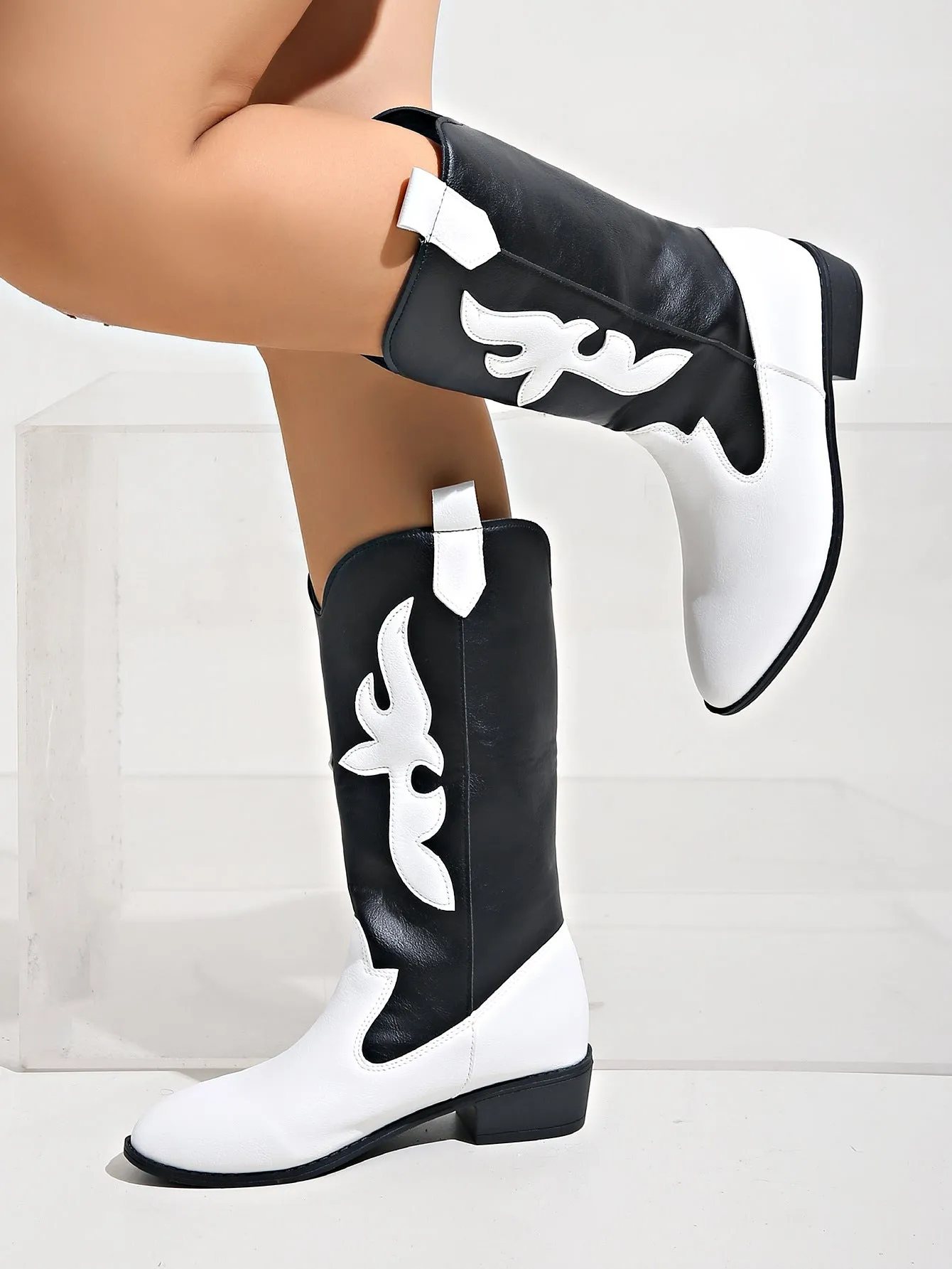 elveswallet Black and white spliced pointed toe knight boots