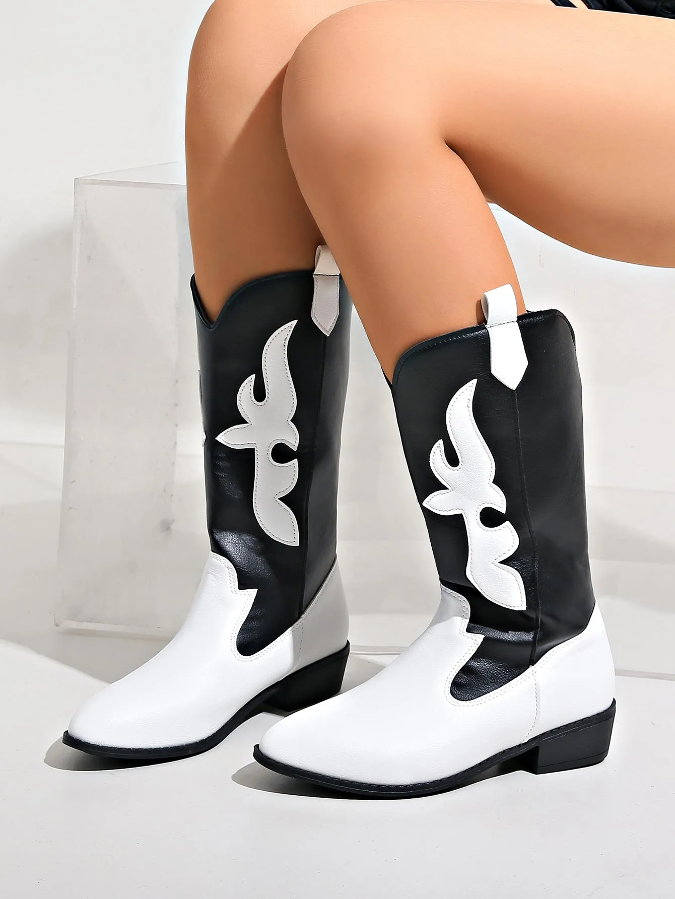 elveswallet Black and white spliced pointed toe knight boots