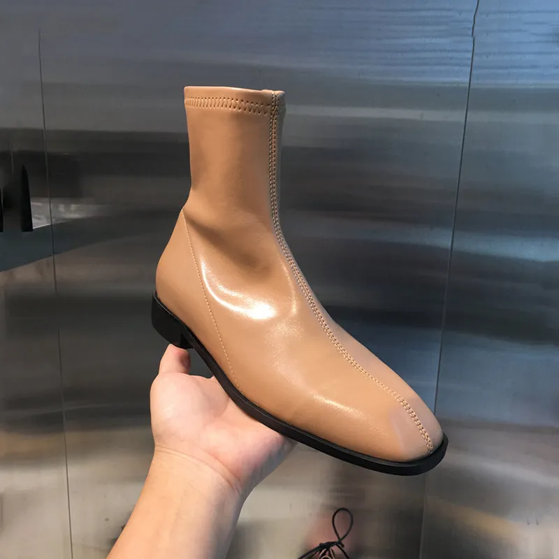 LUXE DESIGN FLAT ANKLE BOOTS WITH SIDE ZIP FASTENING
