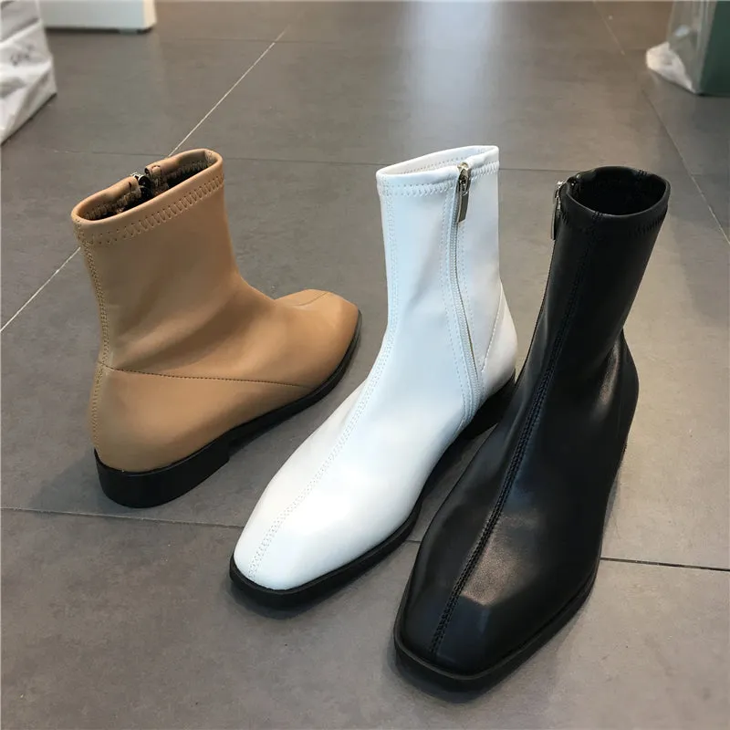 LUXE DESIGN FLAT ANKLE BOOTS WITH SIDE ZIP FASTENING