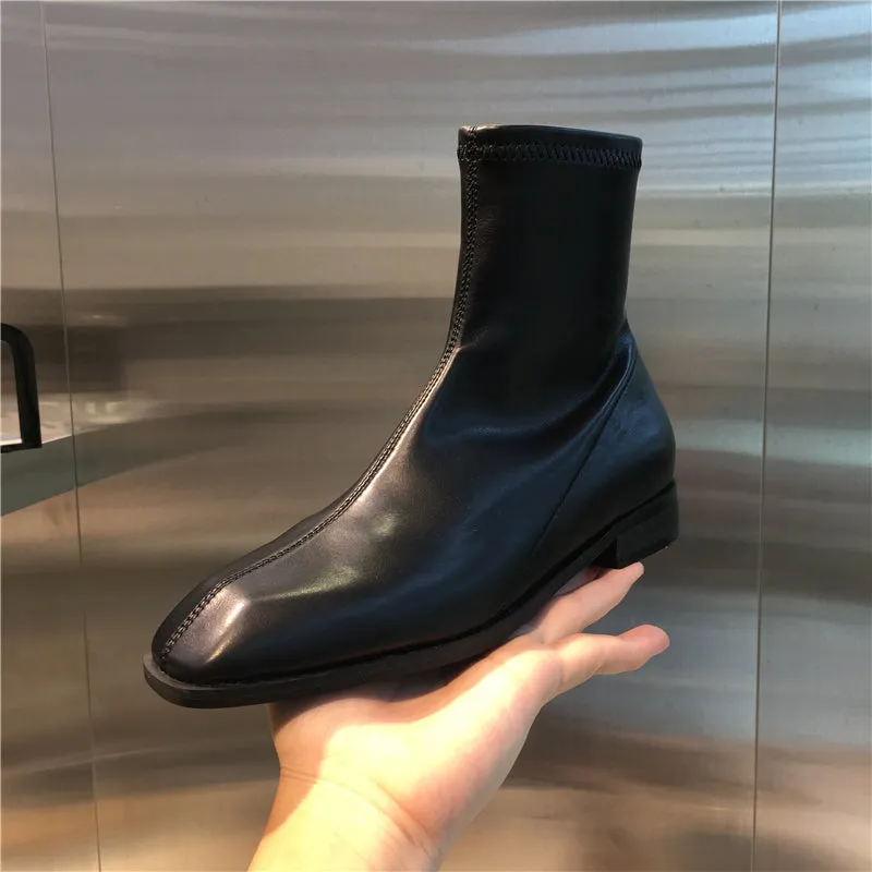 LUXE DESIGN FLAT ANKLE BOOTS WITH SIDE ZIP FASTENING